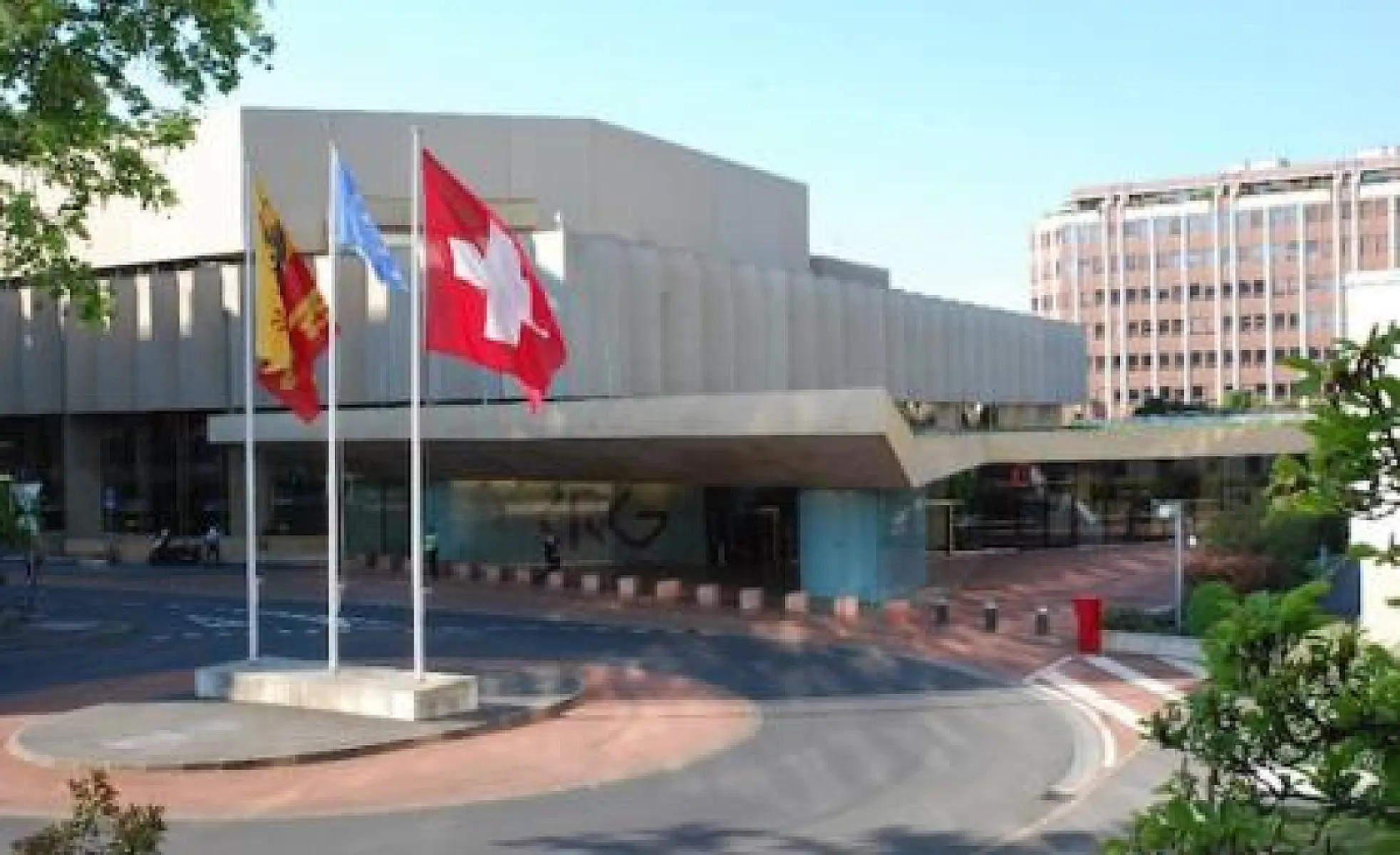 Hot Times in Geneva: How to Force More Drug Ill-Effects on Billions of People and Make Tons of Money