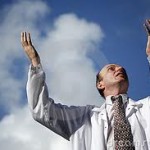 hands raised to the sky